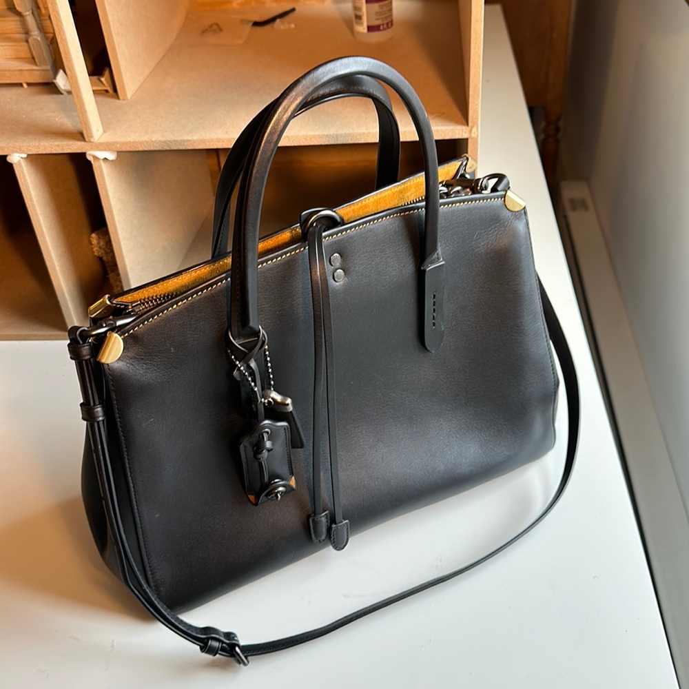Gorgeous coach satchel. Minimal use. Looks clean and new inside.